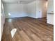 Spacious living room with hardwood floors and ceiling fan at 1027 Adams St, Statesville, NC 28677