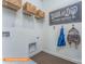 Bright laundry room with shelving and hanging racks at 1129 Red River Dr, Salisbury, NC 28144