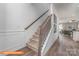 Staircase with simple metal railing leading to the second floor at 1129 Red River Dr, Salisbury, NC 28144