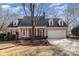 Charming one story home with covered front porch, front yard and attached garage at 11918 Parks Farm Ln, Charlotte, NC 28277