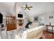 This living room features a fireplace, wood floors and neutral paint colors at 11918 Parks Farm Ln, Charlotte, NC 28277