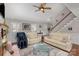 A bright living room with a staircase, wood floors and neutral paint colors at 11918 Parks Farm Ln, Charlotte, NC 28277