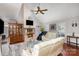 This living room features a fireplace, wood floors and neutral paint colors at 11918 Parks Farm Ln, Charlotte, NC 28277