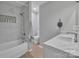 Updated bathroom with marble countertops, shower, and natural lighting at 12325 Parks Farm Ln, Charlotte, NC 28277