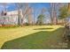 Large backyard with green grass and a privacy fence at 12822 Angel Oak Dr, Huntersville, NC 28078