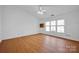 Bright bedroom with hardwood floors and ceiling fan at 12822 Angel Oak Dr, Huntersville, NC 28078