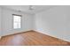 Bright bedroom with wood floors and ceiling fan at 12822 Angel Oak Dr, Huntersville, NC 28078