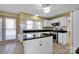 Kitchen with white cabinets, granite countertops, and stainless steel appliances at 12822 Angel Oak Dr, Huntersville, NC 28078