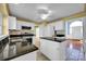 Spacious kitchen with granite countertops and island at 12822 Angel Oak Dr, Huntersville, NC 28078