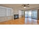 Living room with fireplace and hardwood floors at 12822 Angel Oak Dr, Huntersville, NC 28078