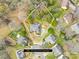 An aerial view with highlighted property lines, showcasing the home's placement and size within a verdant, established neighborhood at 13501 Misty Dew Ct # 19, Charlotte, NC 28273