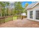 Wooden deck features railings and provides access to the backyard and the house at 13501 Misty Dew Ct # 19, Charlotte, NC 28273