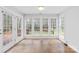 Bright sunroom with lots of natural light, and backyard access at 13501 Misty Dew Ct # 19, Charlotte, NC 28273