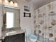 Cozy bathroom featuring a granite countertop vanity, toilet, and shower with nautical curtain at 1412 Great Rd, Waxhaw, NC 28174