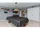 Large game room with pool table, ample storage, and entertainment options at 1412 Great Rd, Waxhaw, NC 28174