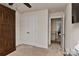 Hallway with doors leading to different rooms; shows floor plan and closet space at 1412 Great Rd, Waxhaw, NC 28174