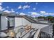 This rooftop patio has a comfortable seating arrangement and string lights strung above at 14139 Loyola Ridge Dr, Charlotte, NC 28277