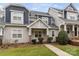 Inviting townhome with a covered porch and manicured landscaping at 14955 Alexander Place Dr, Huntersville, NC 28078