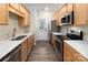 Stylish kitchen with stainless appliances and white countertops at 14955 Alexander Place Dr, Huntersville, NC 28078