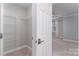 A bedroom with walk-in closet at 14955 Alexander Place Dr, Huntersville, NC 28078