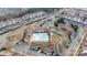 A high aerial view of the neighborhood pool and tennis courts in the community at 16436 Redstone Mountain Ln, Charlotte, NC 28277