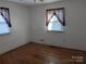 Simple bedroom with hardwood floors and window at 1674 Fallston Rd, Shelby, NC 28150