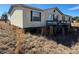 View of the mobile home's side and deck at 169 Adams Cir, Candor, NC 27229