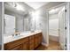 Bathroom featuring double vanity, large mirror, and tiled floor at 1765 Old Clay Hill Rd, York, SC 29745