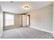 Bedroom with neutral walls, carpet, window, and closet at 1765 Old Clay Hill Rd, York, SC 29745