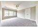 Bright bedroom with neutral walls, carpet, and a large window at 1765 Old Clay Hill Rd, York, SC 29745