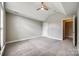 Spacious bedroom featuring neutral walls, carpet, and a ceiling fan at 1765 Old Clay Hill Rd, York, SC 29745