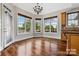 Charming breakfast nook featuring hardwood floors, bay windows, and a chandelier at 1765 Old Clay Hill Rd, York, SC 29745