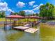 Beautiful dock with boat slip and gazebo provides ultimate waterfront relaxation at 1765 Old Clay Hill Rd, York, SC 29745