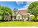 Well-maintained lawn and landscaping highlight the brick and siding exterior of this home at 1765 Old Clay Hill Rd, York, SC 29745