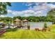 Lakefront view of the lake with dock, gazebos, and lakeside seating at 1765 Old Clay Hill Rd, York, SC 29745