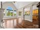 Inviting living room featuring hardwood floors, large windows with lake view, and open floor plan at 1765 Old Clay Hill Rd, York, SC 29745