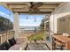 Relaxing balcony with lake view and decorative chandeliers at 17811 Half Moon Ln # E, Cornelius, NC 28031