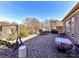 Expansive brick patio features an outdoor dining set and porch swing at 2001 Arbor Hills Dr, Indian Trail, NC 28079