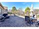 Spacious brick patio featuring a dining table and outdoor furniture at 2001 Arbor Hills Dr, Indian Trail, NC 28079