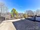 Fenced backyard features well manicured landscaping and patio area at 2001 Arbor Hills Dr, Indian Trail, NC 28079