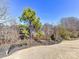 Backyard features professionally installed, low-maintenance landscaping at 2001 Arbor Hills Dr, Indian Trail, NC 28079