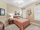 Comfortable bedroom featuring neutral walls and shutters at 2001 Arbor Hills Dr, Indian Trail, NC 28079