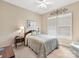 Cozy bedroom with a ceiling fan and windows at 2001 Arbor Hills Dr, Indian Trail, NC 28079