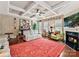 Bright and airy living room with a fireplace, hardwood floors, and a coffered ceiling at 2001 Arbor Hills Dr, Indian Trail, NC 28079