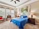 A peaceful main bedroom featuring large windows, soft carpet, and tasteful decor at 2001 Arbor Hills Dr, Indian Trail, NC 28079