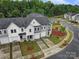 Aerial view of townhouses and surrounding landscape at 215 Briana Marie Way, Indian Trail, NC 28079