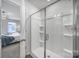 Modern shower with glass enclosure and built-in shelving at 215 Briana Marie Way, Indian Trail, NC 28079