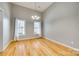 Empty Dining room with stylish hardwood floors, neutral walls, and plenty of natural light at 2288 S Paraham Rd, York, SC 29745