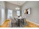 Dining room with stylish rug, neutral walls, and plenty of natural light at 2288 S Paraham Rd, York, SC 29745