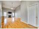 Open-concept living room with hardwood floors, fireplace, and lots of natural light at 2288 S Paraham Rd, York, SC 29745